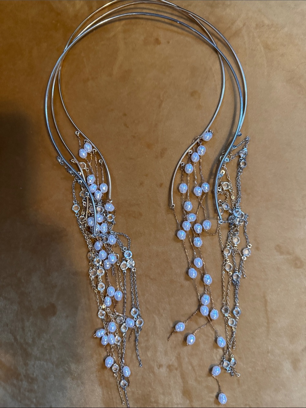 Bundle of Multi-Strand Drop Necklace with Pearl-Like Accents.